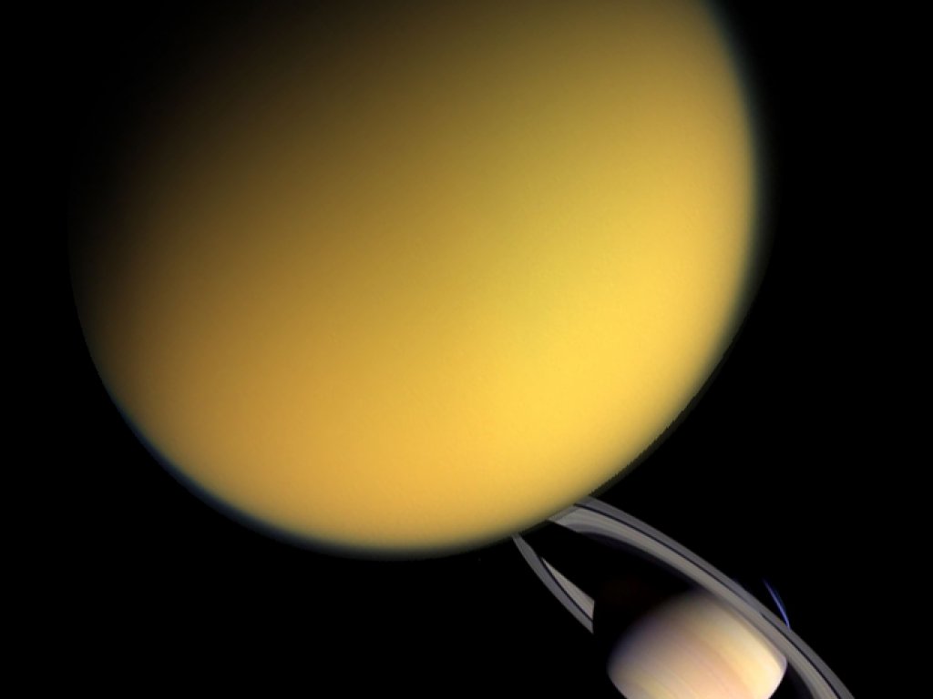 титан спутник сатурна. спутники планет титан. титан спутник сатурна интересные факты. спутник титан планета сатурн. титан луна сатурна.